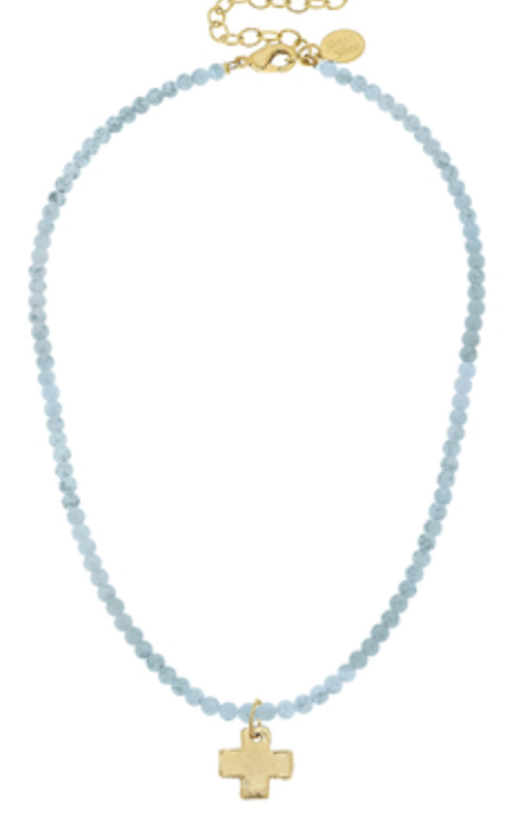 Gold Cross on Light Blue Beaded Necklace